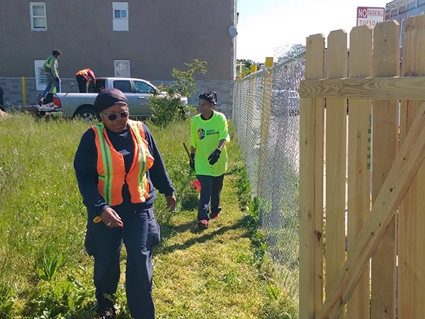 Volunteers at a Spring cleaning and greening event with Carrolton Ridge in Baltimore, MD